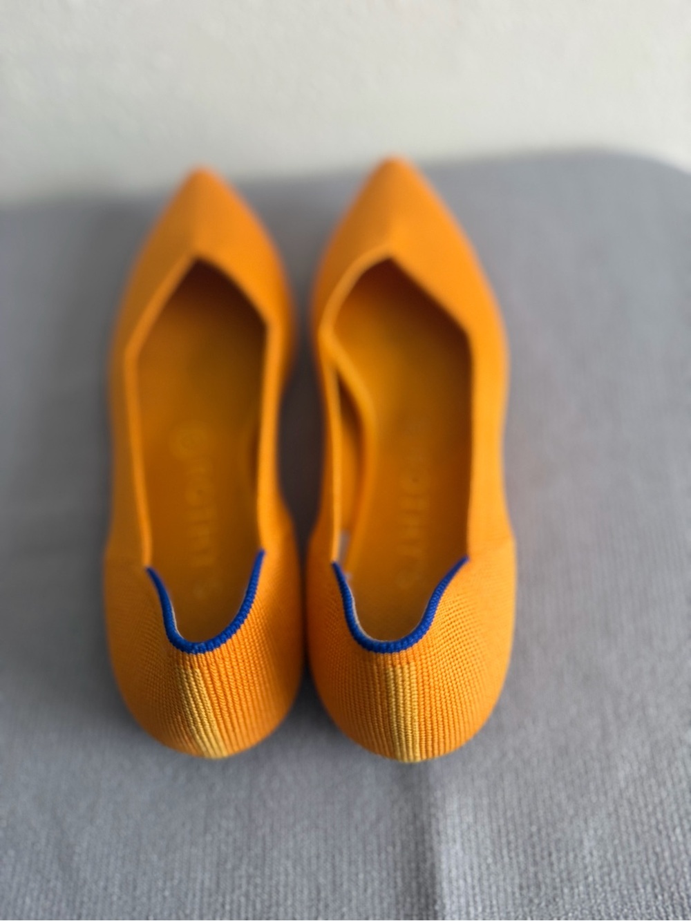 Rothy's Orange Pointed Knit Flats with Blue Piping